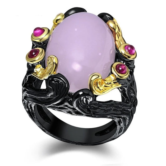 Gothic rings for women, vintage jewelry with fuchsia pink oval zirconia, black and gold color.